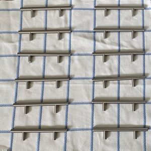 1 dozen “Richelieu” cabinet handles